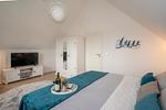 Schlafzimmer - Ferienhaus Nordseeresort 48 Marschengrün Büsum - Top-Hundeurlaub