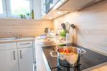 Küche / Küchenzeile - Ferienhaus Nordseeresort 48 Marschengrün Büsum - Top-Hundeurlaub