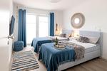 Schlafzimmer - Ferienwohnung Nordseeresort 39a Pier 39 Büsum - Top-Hundeurlaub