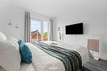 Schlafzimmer - Ferienwohnung Nordseeresort 40b Dock 40 Büsum - Top-Hundeurlaub