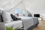 Schlafzimmer - Ferienhaus Nordseeresort 61 Nordsee Lounge Büsum - Top-Hundeurlaub