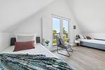 Schlafzimmer - Ferienhaus Nordseeresort 61 Nordsee Lounge Büsum - Top-Hundeurlaub