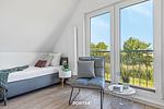 Schlafzimmer - Ferienhaus Nordseeresort 61 Nordsee Lounge Büsum - Top-Hundeurlaub