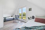 Schlafzimmer - Ferienhaus Nordseeresort 61 Nordsee Lounge Büsum - Top-Hundeurlaub