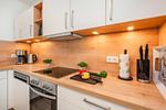 Küche / Küchenzeile - Ferienwohnung Klippenblick mit Sauna, Kinderspielbereich und Fitnessraum - Top-Hundeurlaub