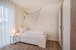 Schlafzimmer - Ferienwohnung Klippenblick mit Sauna, Kinderspielbereich und Fitnessraum - Top-Hundeurlaub