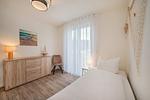 Schlafzimmer - Ferienwohnung Klippenblick mit Sauna, Kinderspielbereich und Fitnessraum - Top-Hundeurlaub