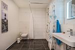 Badezimmer - Ferienwohnung Klippenblick mit Sauna, Kinderspielbereich und Fitnessraum - Top-Hundeurlaub
