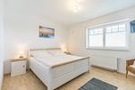 Ferienhaus Kleines Perlenhaus Schlafzimmer - "Kleines Perlenhaus" - Top-Hundeurlaub
