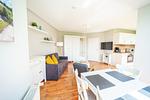 Blick vom Essbereich in den Wohnbereich - Wohnung 035EG - Top-Hundeurlaub