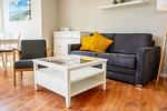Sofa und Sessel im Wohnbereich - Wohnung 035EG - Top-Hundeurlaub