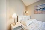 Doppelbett im Schlafzimmer - Wohnung 035EG - Top-Hundeurlaub
