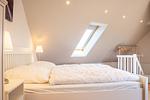Doppelbett im Schlafzimmer - Wohnung 035OG - Top-Hundeurlaub