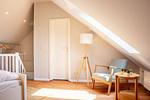 gemütlicher Sessel im Schlafzimmer - Wohnung 035OG - Top-Hundeurlaub
