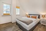 Schlafzimmer - Ferienhaus JoHann mit Sauna, großer Terrasse und moderner Einrichtung - Top-Hundeurlaub