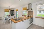 Wohnzimmer - Ferienhaus JoHann mit Sauna, großer Terrasse und moderner Einrichtung - Top-Hundeurlaub