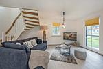 Wohnzimmer - Ferienhaus JoHann mit Sauna, großer Terrasse und moderner Einrichtung - Top-Hundeurlaub