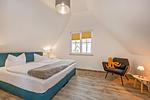 Schlafzimmer - Ferienhaus JoHann mit Sauna, großer Terrasse und moderner Einrichtung - Top-Hundeurlaub