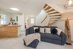 Wohnzimmer - Ferienhaus JoHann mit Sauna, großer Terrasse und moderner Einrichtung - Top-Hundeurlaub