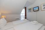 Schlafzimmer - Ferienwohnung W16.3.S - Top-Hundeurlaub