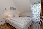 Schlafzimmer - Ferienwohnung W16.3.S - Top-Hundeurlaub