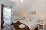 Schlafzimmer - Ferienwohnung W16.3.S - Top-Hundeurlaub