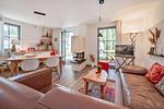 Wohnzimmer - Ferienhaus Auszeitfischer mit Sauna, Kamin und Terrasse - Top-Hundeurlaub