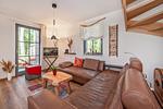 Wohnzimmer - Ferienhaus Auszeitfischer mit Sauna, Kamin und Terrasse - Top-Hundeurlaub
