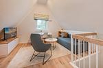 Wohnzimmer - Ferienhaus Haffglück mit Sauna, Kamin und Terrasse mit Haffblick - Top-Hundeurlaub
