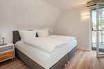 Schlafzimmer - Ferienhaus Haffglück mit Sauna, Kamin und Terrasse mit Haffblick - Top-Hundeurlaub