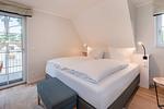 Schlafzimmer - Ferienhaus Haffglück mit Sauna, Kamin und Terrasse mit Haffblick - Top-Hundeurlaub