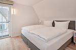 Schlafzimmer - Ferienhaus Haff-Traum mit Kamin, Sauna und Terrasse - Top-Hundeurlaub