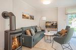 Wohnzimmer - Ferienhaus Haff-Sommer mit Kamin, Sauna und Terrasse - Top-Hundeurlaub