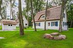 Hauptansicht - Ferienhaus Im Kiefernwäldchen mit Sauna, Kamin und Terrasse - Top-Hundeurlaub