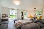 Wohnzimmer - Ferienhaus Im Kiefernwäldchen mit Sauna, Kamin und Terrasse - Top-Hundeurlaub