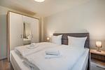 Schlafzimmer - Ferienhaus Im Kiefernwäldchen mit Sauna, Kamin und Terrasse - Top-Hundeurlaub
