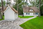 Fassade / Eingang - Ferienhaus Im Kiefernwäldchen mit Sauna, Kamin und Terrasse - Top-Hundeurlaub