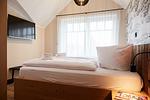 Schlafzimmer - Haus 1 Deluxe-Apartment 9 - Top-Hundeurlaub