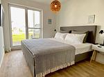 Schlafzimmer - Ferienwohnung Pier 21 Olpenitz - Top-Hundeurlaub