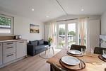 Wohnzimmer - Ferienhaus "KleineDüne", eingezäuntes Grundstück (103) - Top-Hundeurlaub