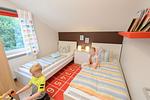 Schlafzimmer mit zwei Einzelbetten - Ferienhaus Jette - Top-Hundeurlaub