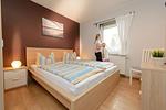 Schlafzimmer mit Doppelbett - Ferienhaus Jette - Top-Hundeurlaub