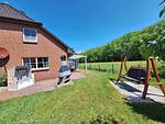 Gartenblick - Ferienhaus Medemstern II - Top-Hundeurlaub