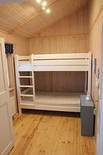 Schlafzimmer mit Hochbett - Ferienhaus Nordseebrise - Top-Hundeurlaub