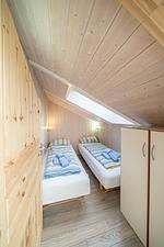 Schlafzimmer mit zwei Einzelbetten - Ferienhaus Nordseeparadies - Top-Hundeurlaub