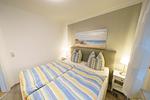 Schlafzimmer mit Doppelbett - Ferienhaus Pepe - Top-Hundeurlaub