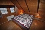 Schlafzimmer mit Doppelbett - Ferienhaus Seeadler - Top-Hundeurlaub