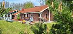 Außenansicht und Garten - Ferienhaus Strandmuschel - Top-Hundeurlaub