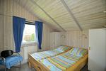 Schlafzimmer mit Doppelbett - Ferienhaus Stüven - Top-Hundeurlaub