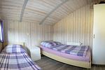 Schlafzimmer mit zwei Einzelbetten - Ferienhaus Stüven - Top-Hundeurlaub